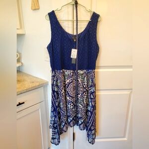 NWT Sleeveless XL dress, flowy handkerchief skirt. Crochet navy blue top, lined.